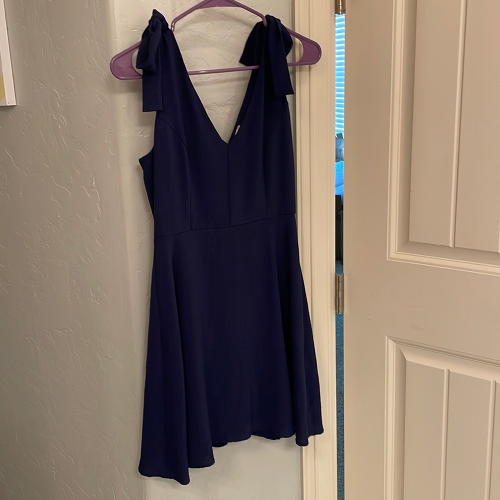 Navy mini dress with ties on shoulders